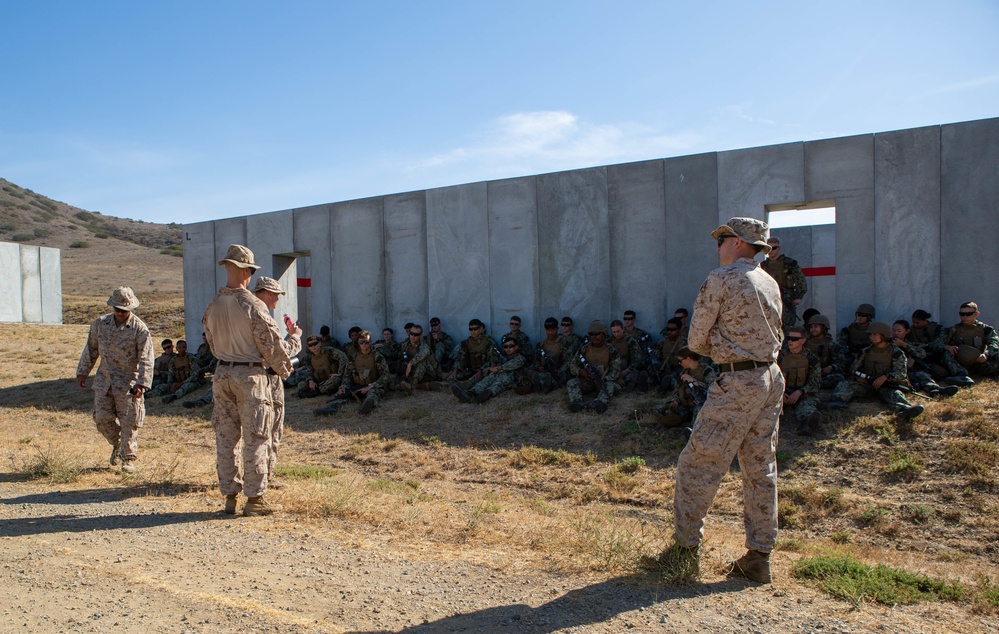 U.S. Naval Academy midshipmen take on U.S. Marine Corps Training