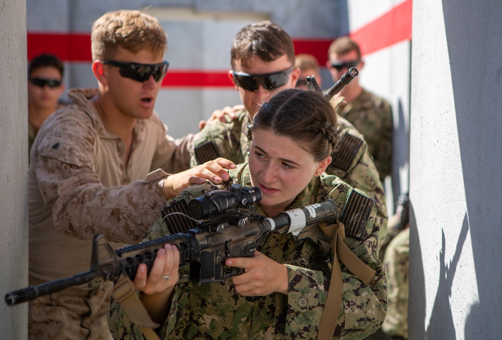 U.S. Naval Academy midshipmen take on U.S. Marine Corps Training