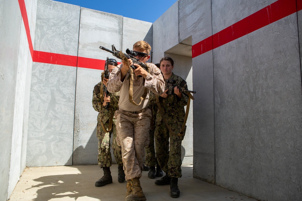 U.S. Naval Academy midshipmen take on U.S. Marine Corps Training