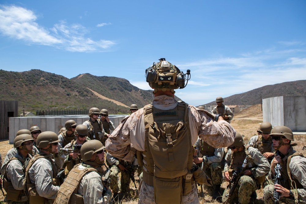 U.S. Naval Academy midshipmen take on U.S. Marine Corps Training