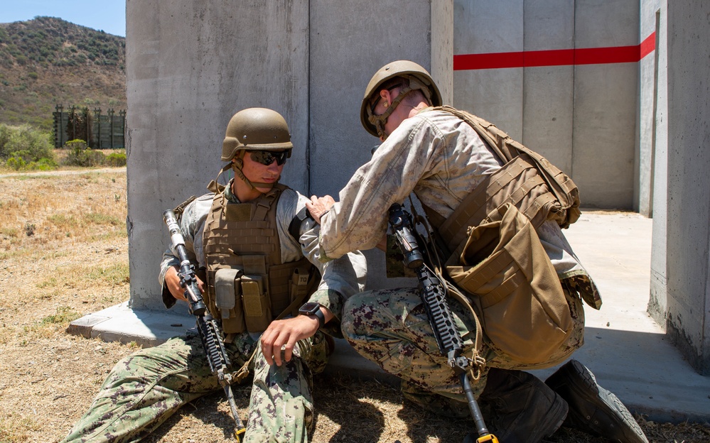 U.S. Naval Academy midshipmen take on U.S. Marine Corps Training