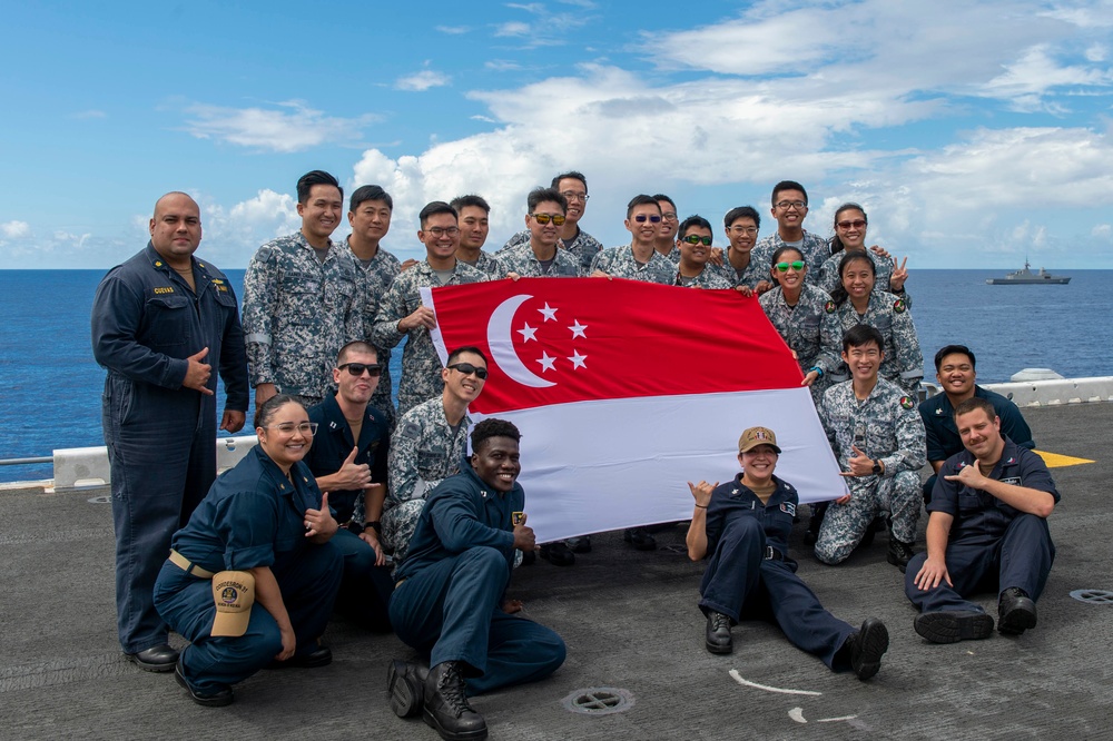 Multinational Partners Pose for Photo During RIMPAC 2022