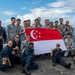 Multinational Partners Pose for Photo During RIMPAC 2022