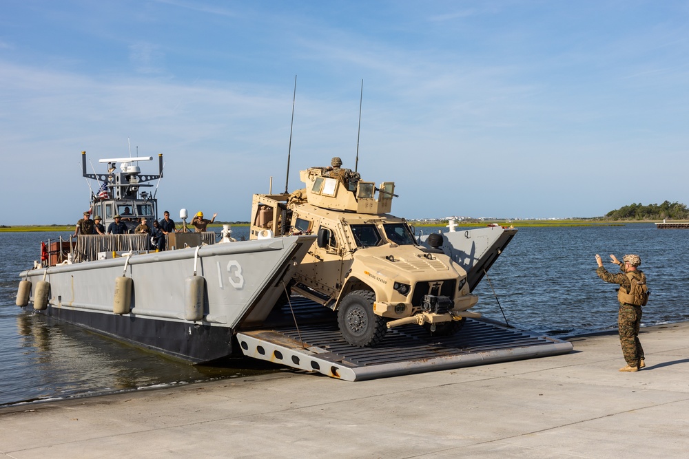 Combat Logistics Regiment 2 and 2nd Marine Division embark tactical vehicles aboard U.S. Navy landing craft during Technology Operational Experimentation Exercise 2022