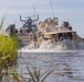 Combat Logistics Regiment 2 and 2nd Marine Division embark tactical vehicles aboard U.S. Navy landing craft during Technology Operational Experimentation Exercise 2022