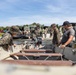Combat Logistics Regiment 2 and 2nd Marine Division embark tactical vehicles aboard U.S. Navy landing craft during Technology Operational Experimentation Exercise 2022