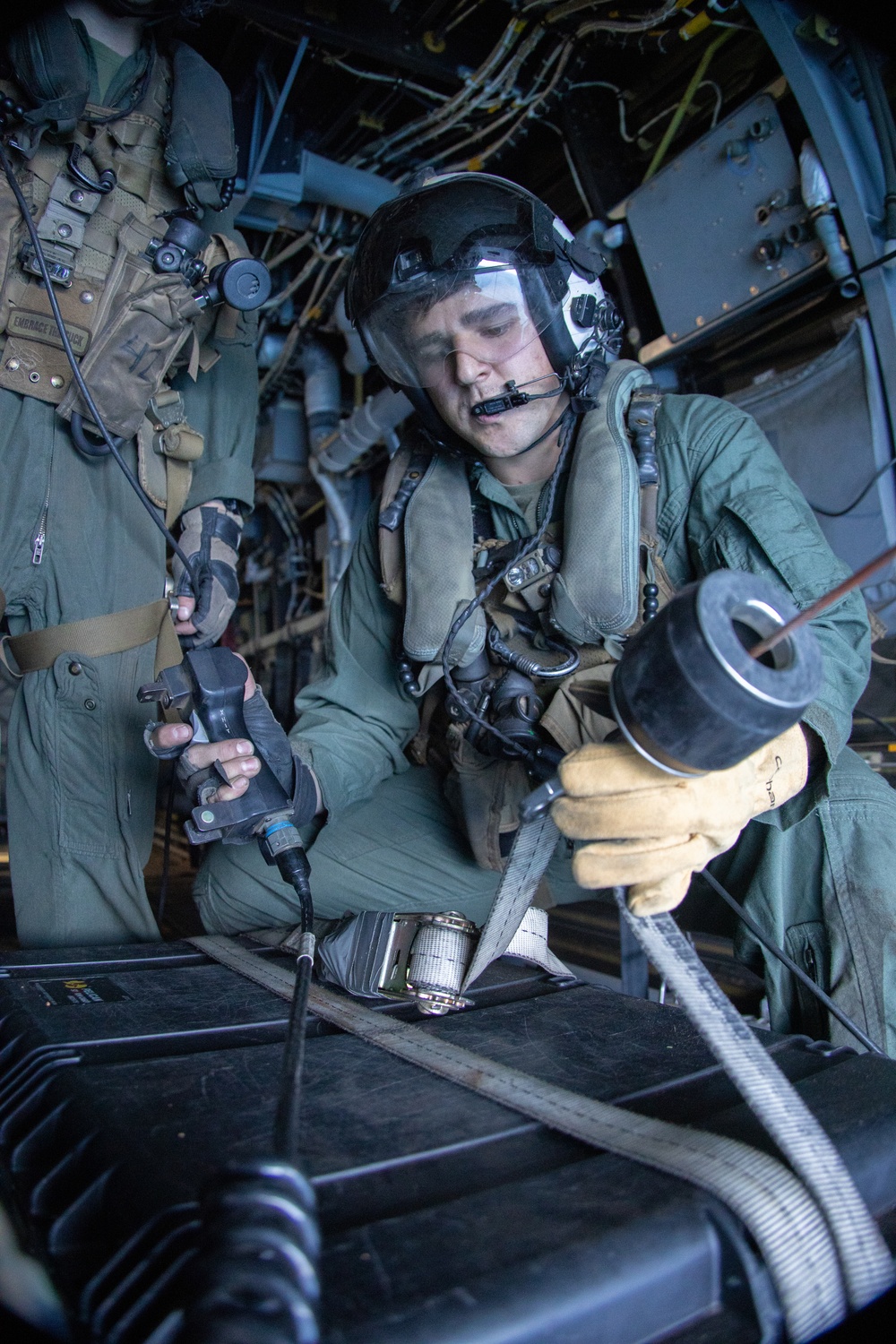 U.S. Marine Corps MV-22B Osprey resupplies U.S. Navy submarine