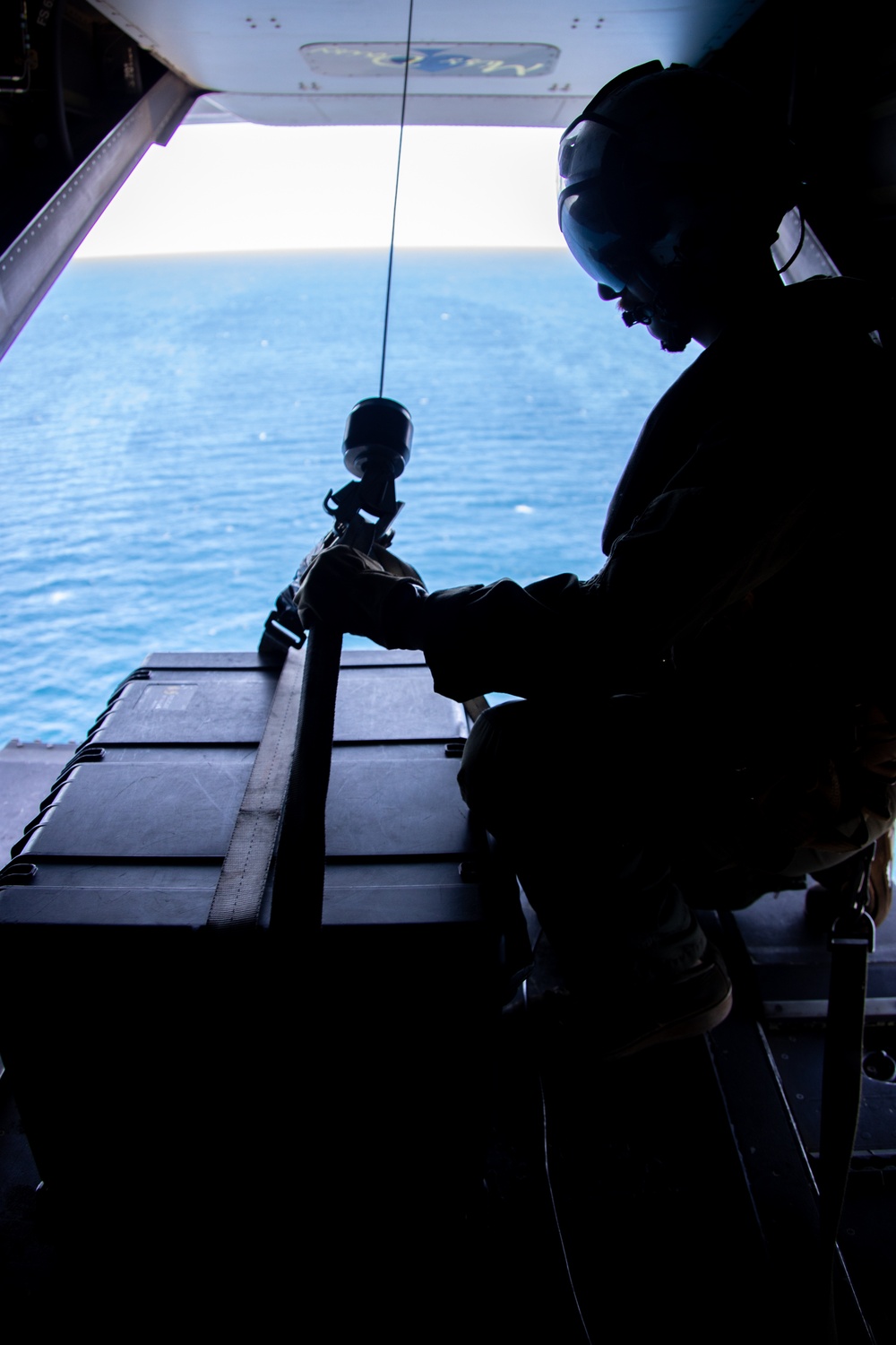 U.S. Marine Corps MV-22B Osprey resupplies U.S. Navy submarine