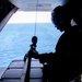 U.S. Marine Corps MV-22B Osprey resupplies U.S. Navy submarine