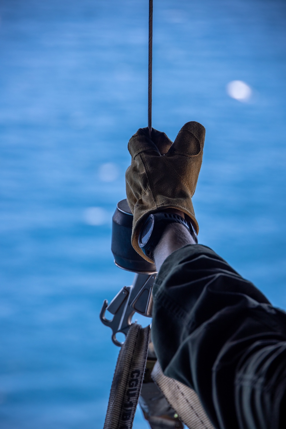 U.S. Marine Corps MV-22B Osprey resupplies U.S. Navy submarine