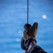 U.S. Marine Corps MV-22B Osprey resupplies U.S. Navy submarine