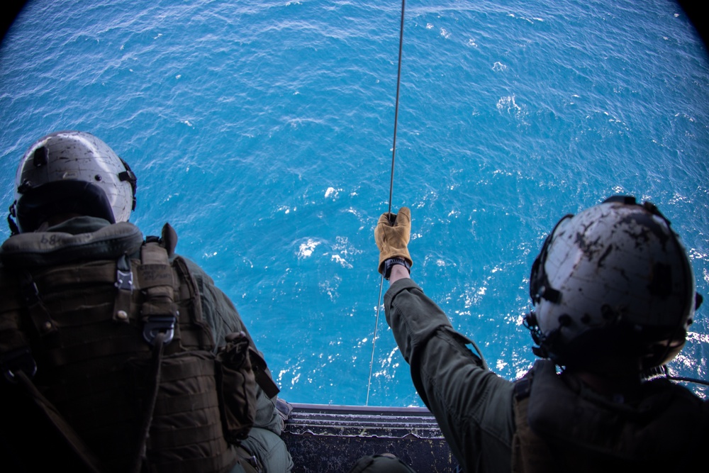 U.S. Marine Corps MV-22B Osprey resupplies U.S. Navy submarine