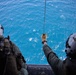 U.S. Marine Corps MV-22B Osprey resupplies U.S. Navy submarine