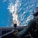 U.S. Marine Corps MV-22B Osprey resupplies U.S. Navy submarine