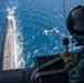U.S. Marine Corps MV-22B Osprey resupplies U.S. Navy submarine