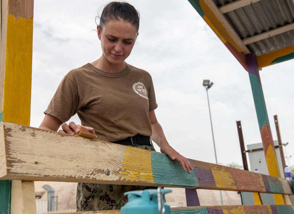 Camp Lemonnier volunteers renovate sexual assault awareness and prevention bus stop