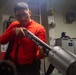 USS Ronald Reagan Sailors maintain weapons in armory