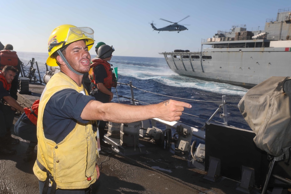 USS Cole Conducts a replenishment at sea with USNS Supply