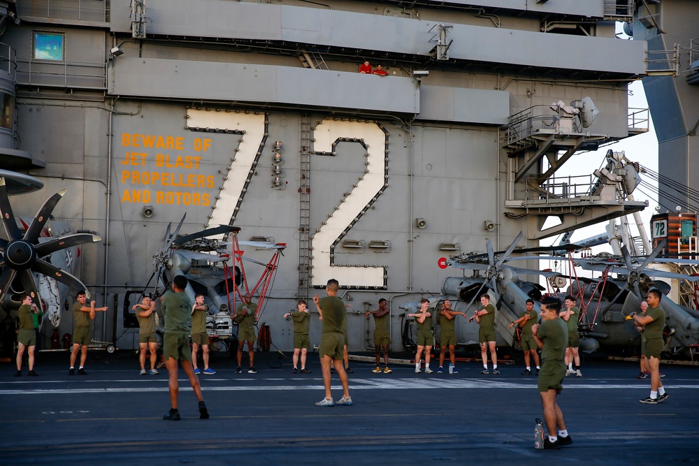 Black Knights of VMFA 314 exercise on the flight deck of Abraham Lincoln