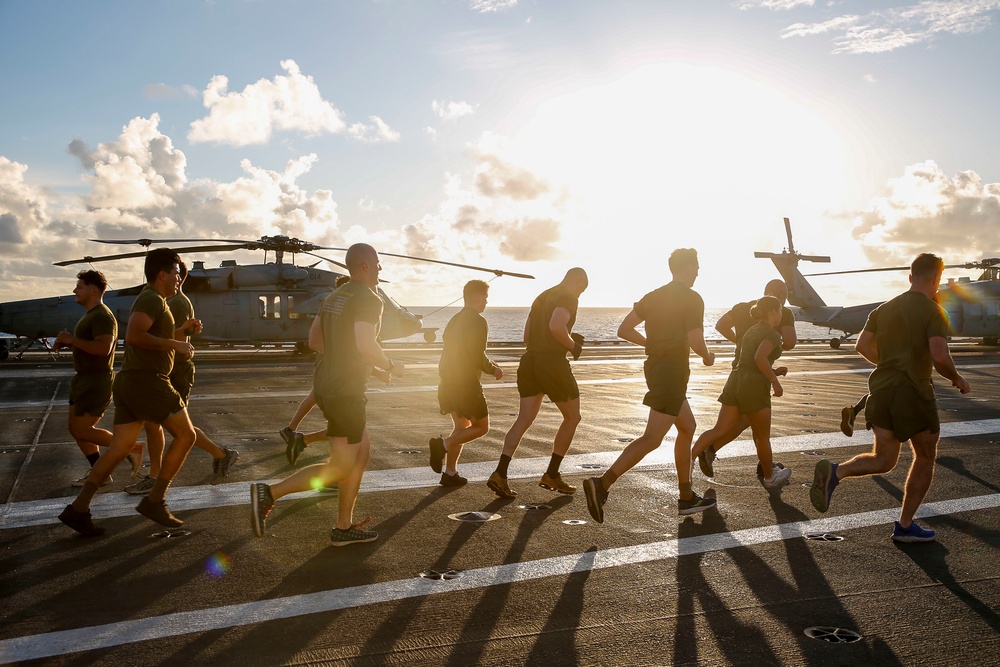 Black Knights of VMFA 314 exercise on the flight deck of Abraham Lincoln