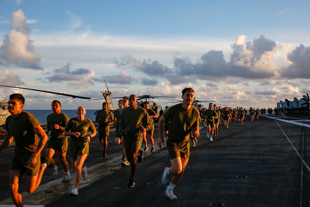 Black Knights of VMFA 314 exercise on the flight deck of Abraham Lincoln