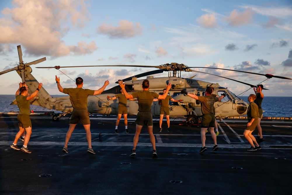 Black Knights of VMFA 314 exercise on the flight deck of Abraham Lincoln