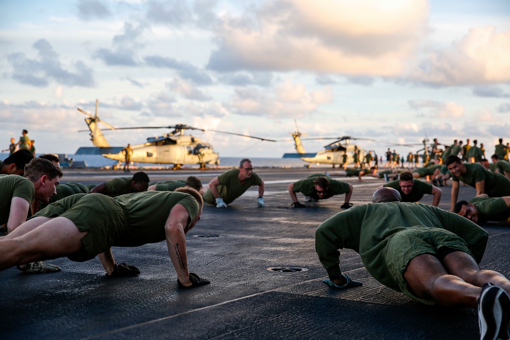 Black Knights of VMFA 314 exercise on the flight deck of Abraham Lincoln