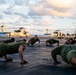 Black Knights of VMFA 314 exercise on the flight deck of Abraham Lincoln