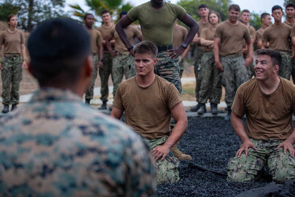 U.S. Naval Academy midshipmen take on U.S. Marine Corps Training