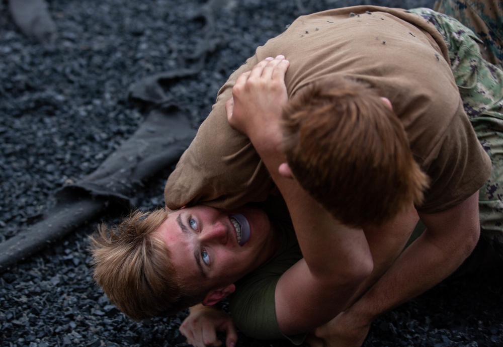 U.S. Naval Academy midshipmen take on U.S. Marine Corps Training