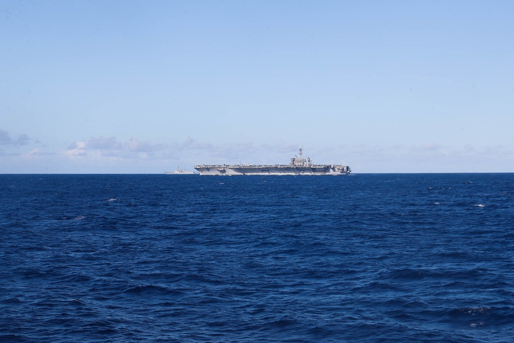 Mobile Bay transits the Pacific Ocean with allied and partner vessels during RIMPAC 2022