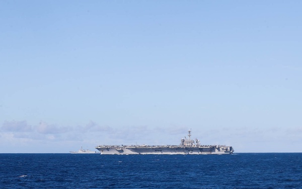 Mobile Bay transits the Pacific Ocean with allied and partner vessels during RIMPAC 2022