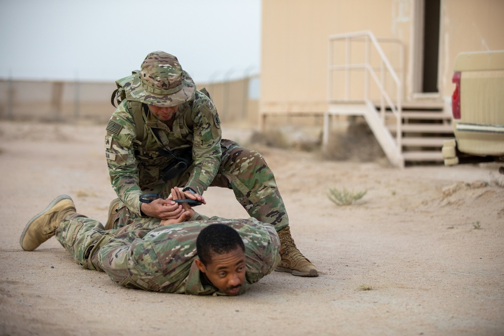 U.S. Soldiers take Expert Soldier Badge test at Camp Buehring