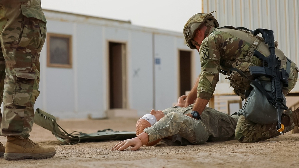 U.S. Soldiers take Expert Soldier Badge test at Camp Buehring