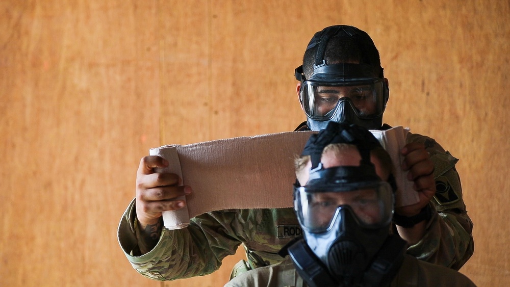 U.S. Soldiers take Expert Soldier Badge test at Camp Buehring