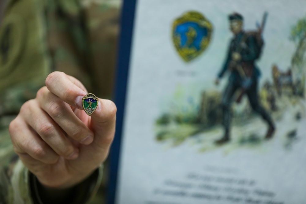 11th CAB Soldiers awarded Norwegian Foot March Badge and combat patches