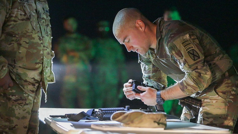 U.S. Soldiers take Expert Soldier Badge test at Camp Buehring