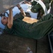 HMLA-775 conducts pre-flight maintenance