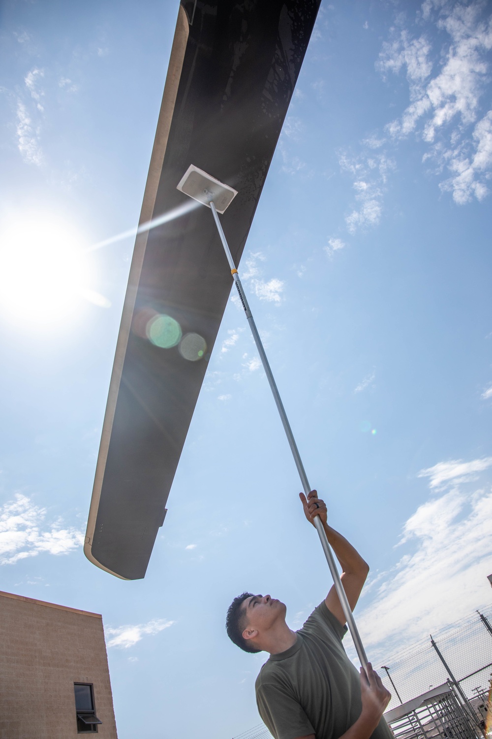 HMLA-775 conducts pre-flight maintenance