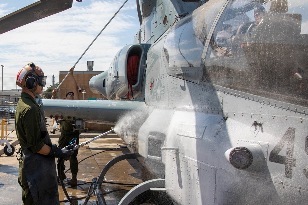 HMLA-775 conducts pre-flight maintenance