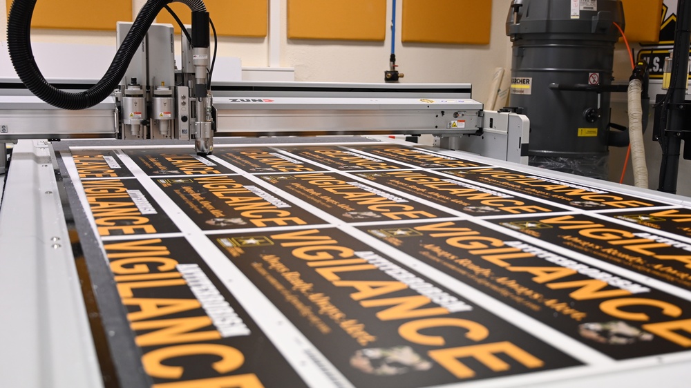 Garrison employee’s face with message innovation goes theater-wide