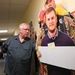 Garrison employee’s face with message innovation goes theater-wide