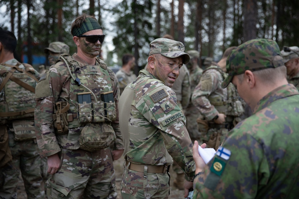 U.S. and Finnish Soldiers Conduct a Situational Training Exercise