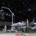 Multicapable Wolf Pack personnel perform an F-16 Fighter Falcon canopy replacement during RF-A 22-3