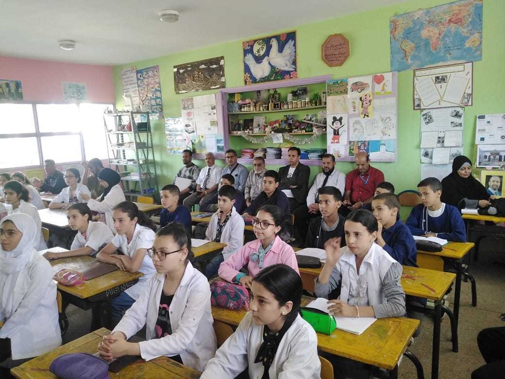 Representatives of the Yemen Ministry of Education observe teaching and learning in a class in rural Morocco