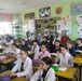 Representatives of the Yemen Ministry of Education observe teaching and learning in a class in rural Morocco