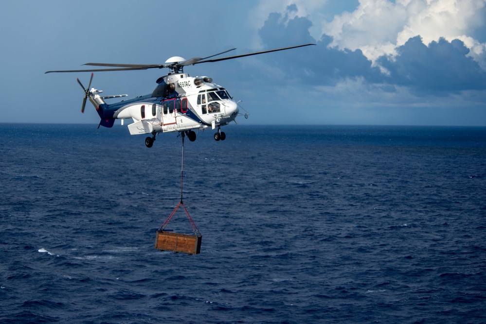 USS Ronald Reagan (CVN 76) conducts replenishment-at-sea with USNS Carl Brashear (T-AKE 7)