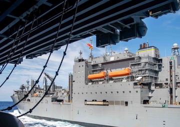 USS Ronald Reagan (CVN 76) conducts replenishment-at-sea with USNS Carl Brashear (T-AKE 7)