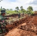 Soldiers from the 130th Engineer Brigade, TNI conducts joint road repair