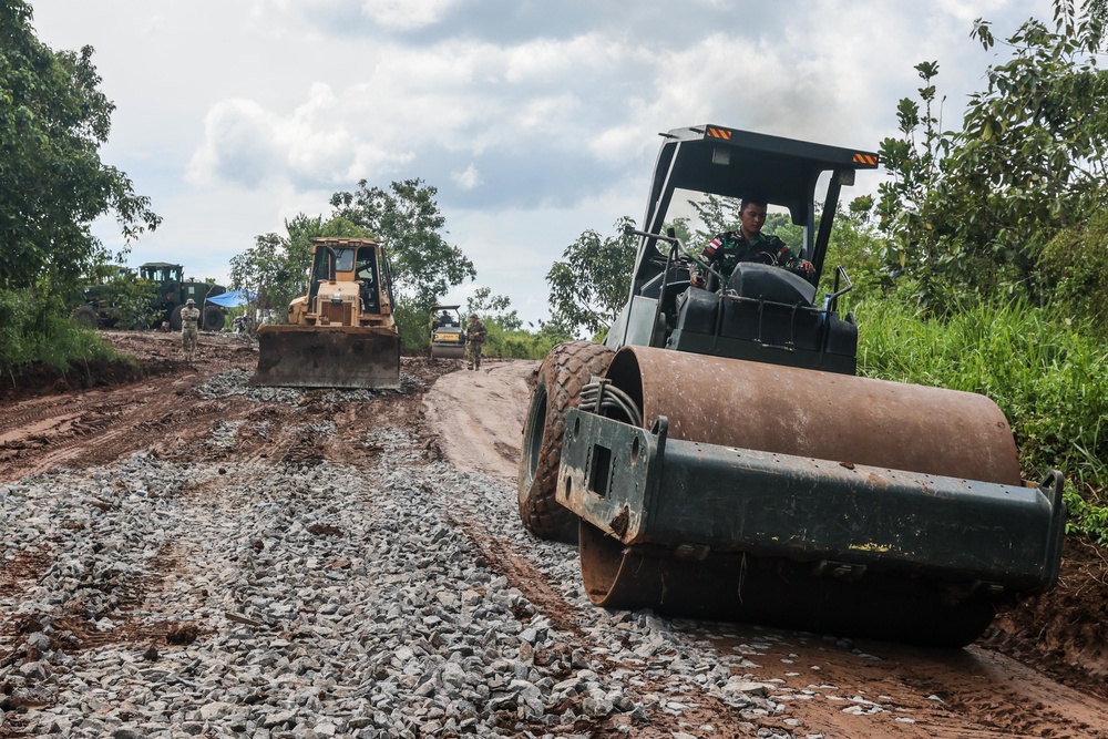 Soldiers from the 130th Engineer Brigade, TNI conducts joint road repair